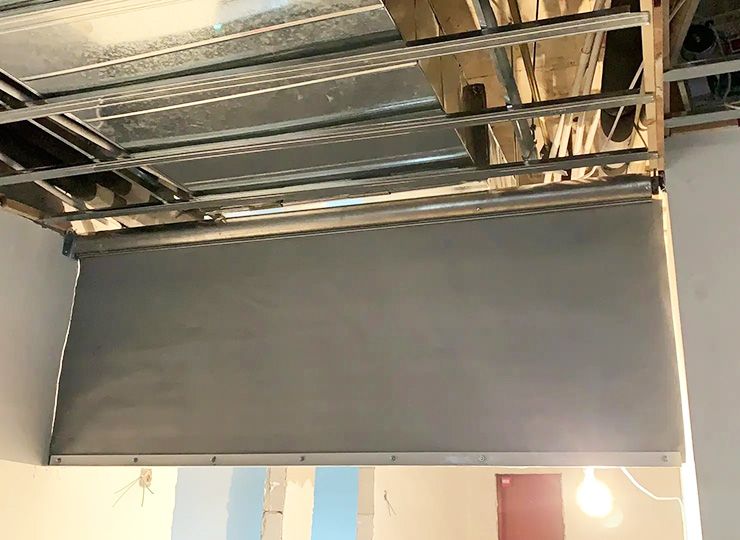 擋煙垂壁布是如何防火的？